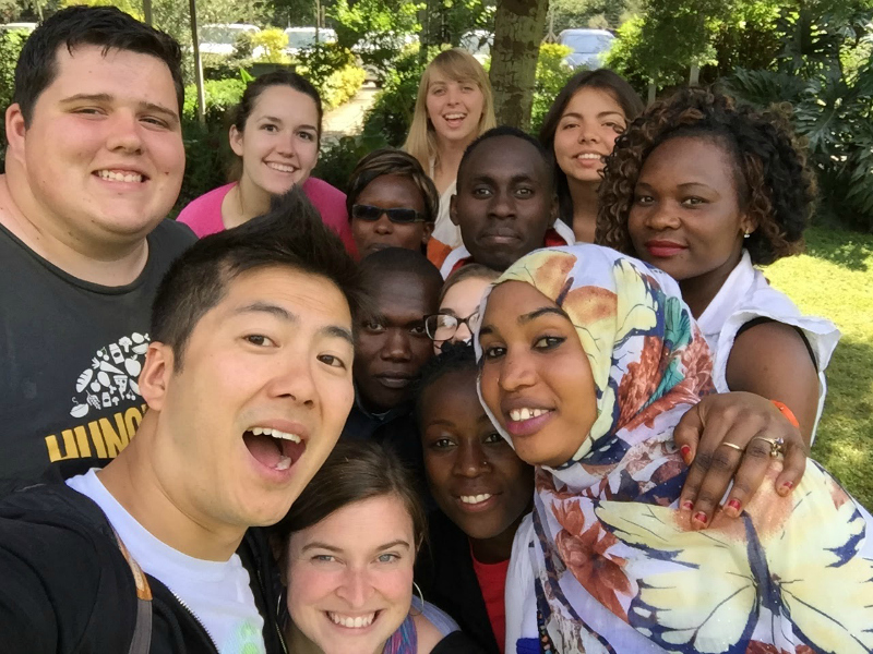 Canadian and Kenyan youth and young adults smiling