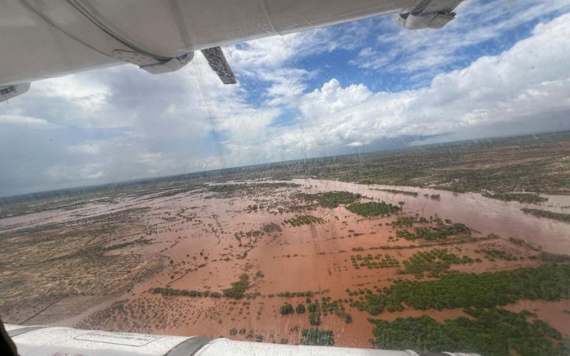 he view from a plane flying over a flooded region. The scene is mostly water.