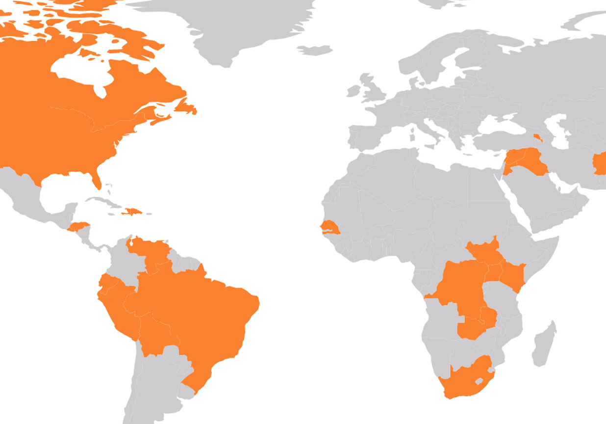 An illustration of a world map showing the countries in orange where World Vision responded to the Covid-19 outbreak.