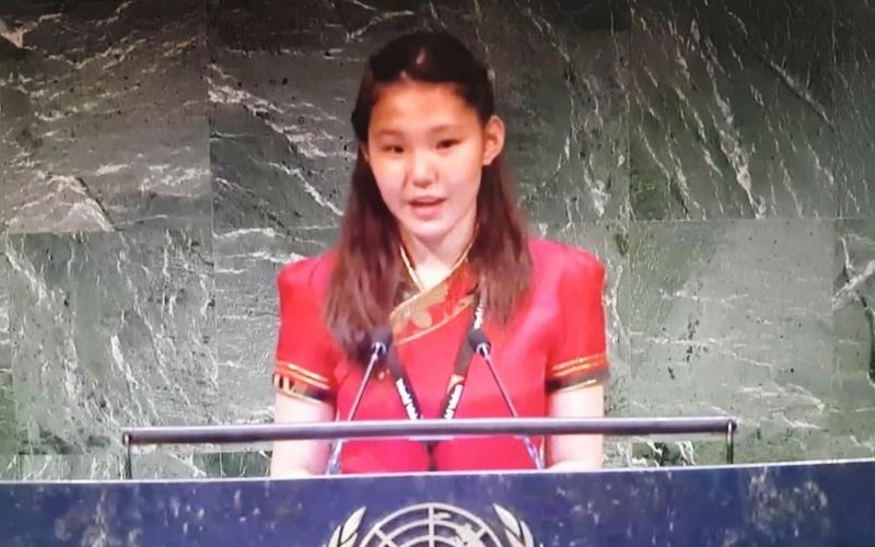 Nomundari stands at a podium at the United Nations