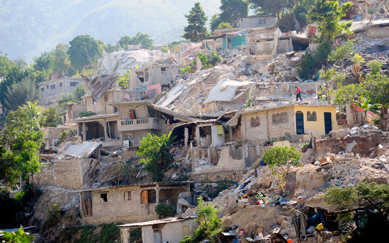 Ruined homes on a hillside in Haiti.
