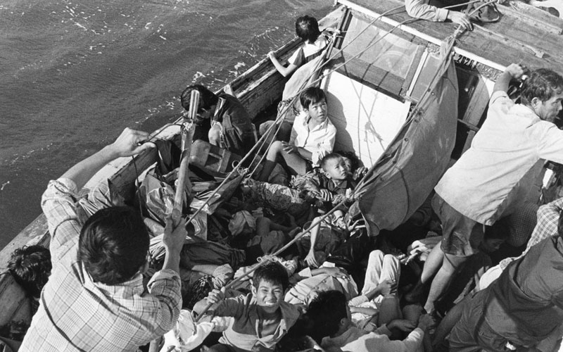 A group of Vietnamese refugees in a boat.