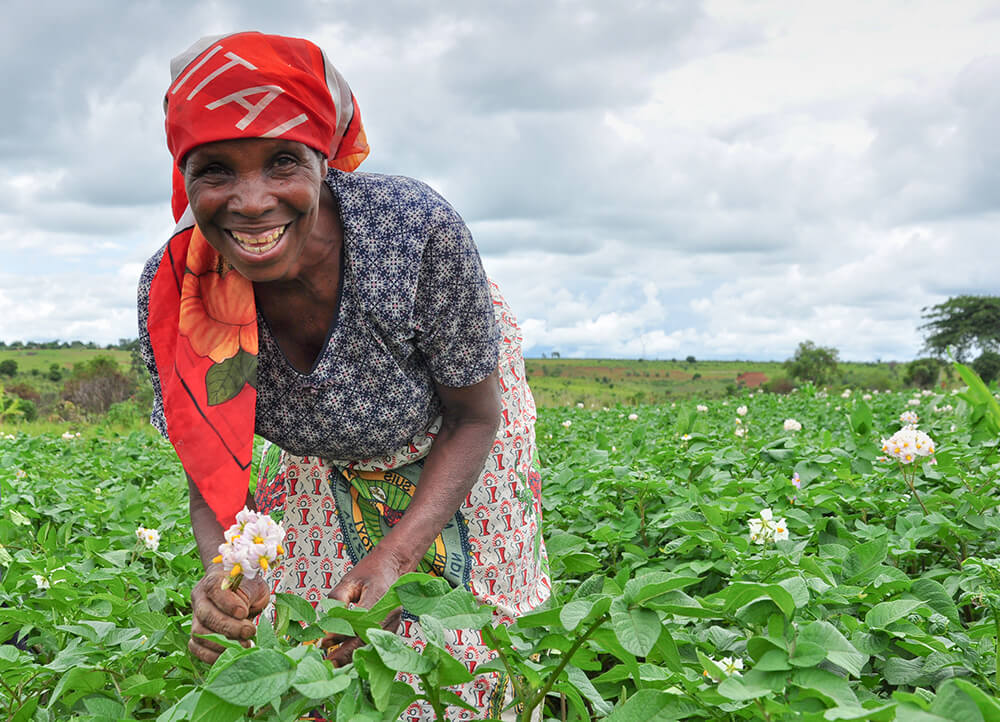 53-year-old Doliana from Angola, working in her farmland