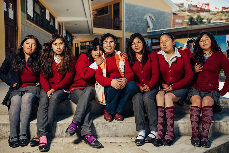 Doris sits besides a group of students from Bolivia.