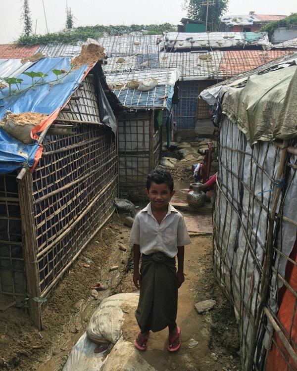 A boy stands in Cox's Bazar Bangladesh