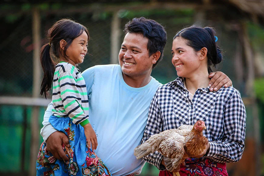 Socheata and her family, with the support from World Vision, received an animal through the BRAG project, which aims to help poor households in Cambodia. Raising chickens is an activity that benefits the whole family.