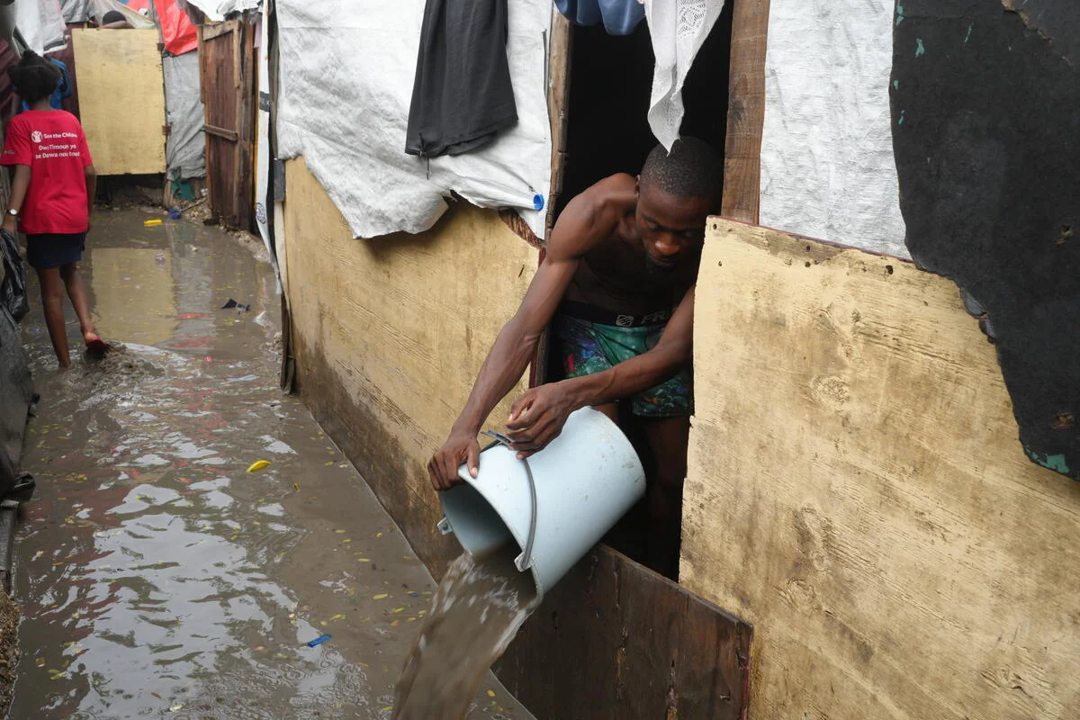 Scenes from Camp Domond in Port-au-Prince flooded after the torrential rains of Hurricane Melissa. Photo Credit: Joseph Odelyn