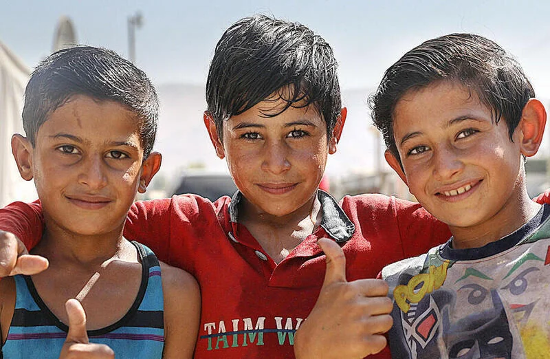 syrian boys smiling