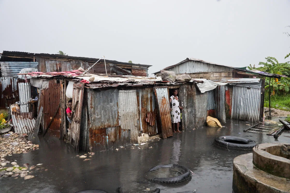 Photo Credit: Joseph Odelyn Scene from La Savane, locality close to the sea. The rising water flooded the houses. Most of the families moved to temporary shelters.