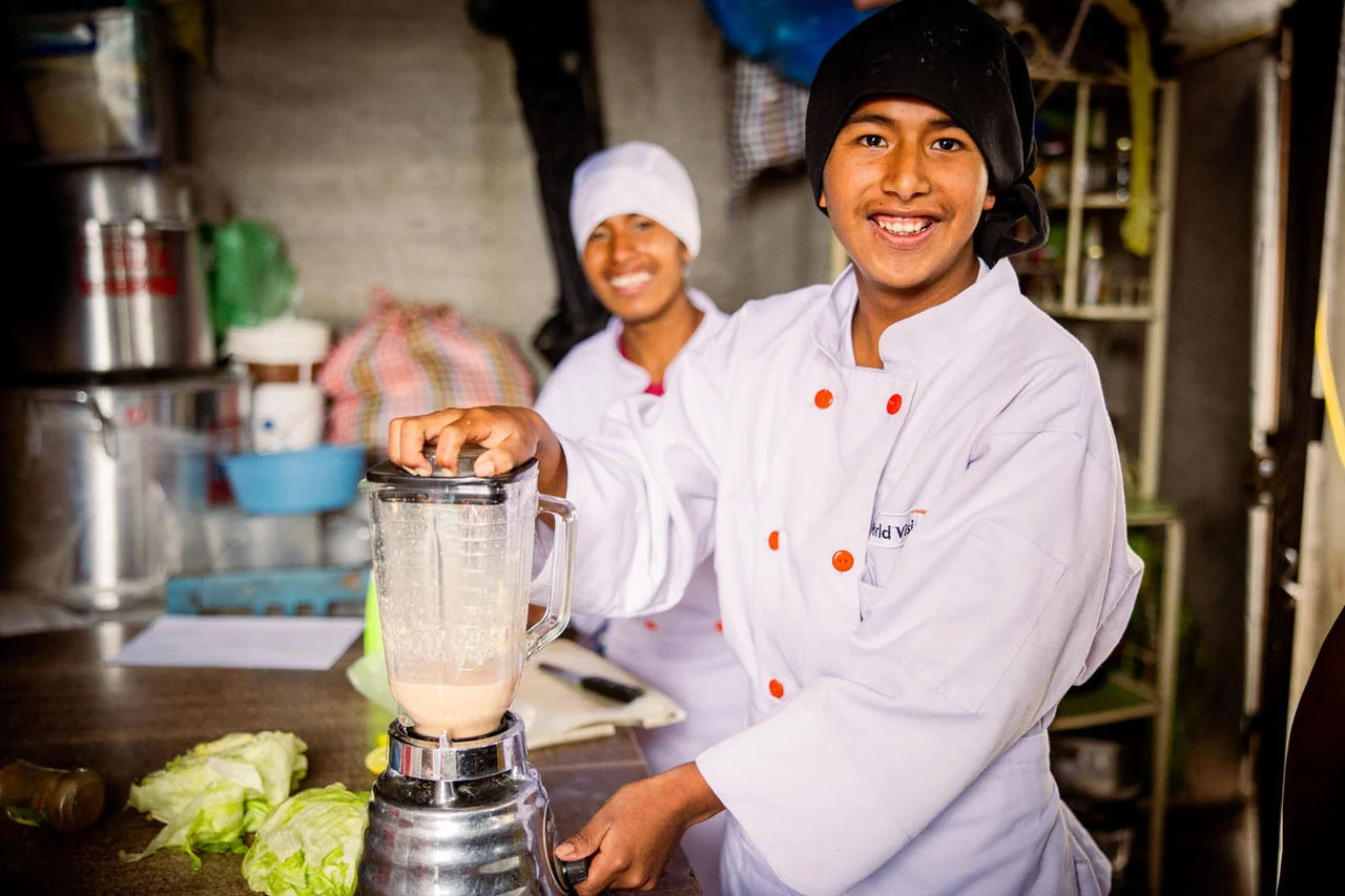 Elvis, 16, Youth Ready Graduate, Peru, working his food cart business