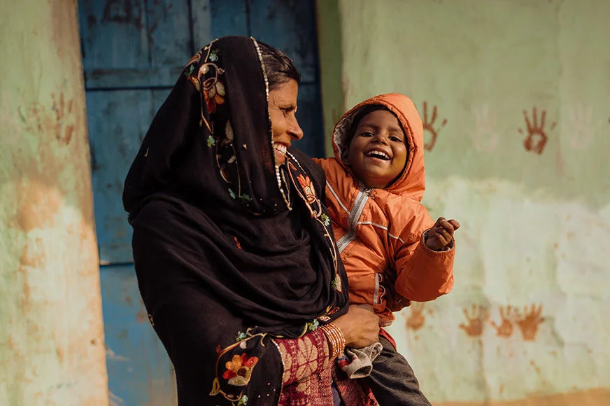 Rinku holds her daughter, Nidhi, in her arms. Together, they are part of World Vision’s nutrition program in Nepal, helping families overcome malnutrition.