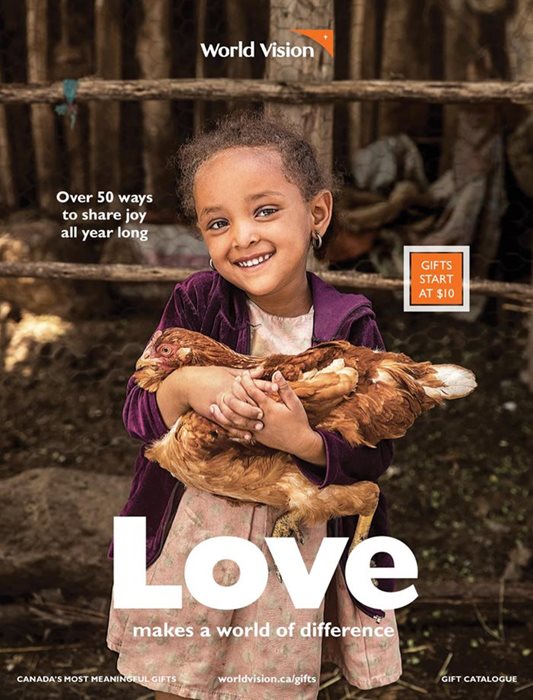 World Vision Canada gift catalogue cover featuring a little Ethiopia girl holding a chicken.